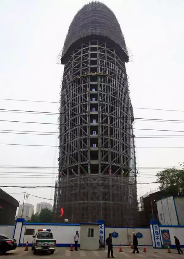 Record One China House Builder Builds A 14story Building like "Man hood" in 2day 